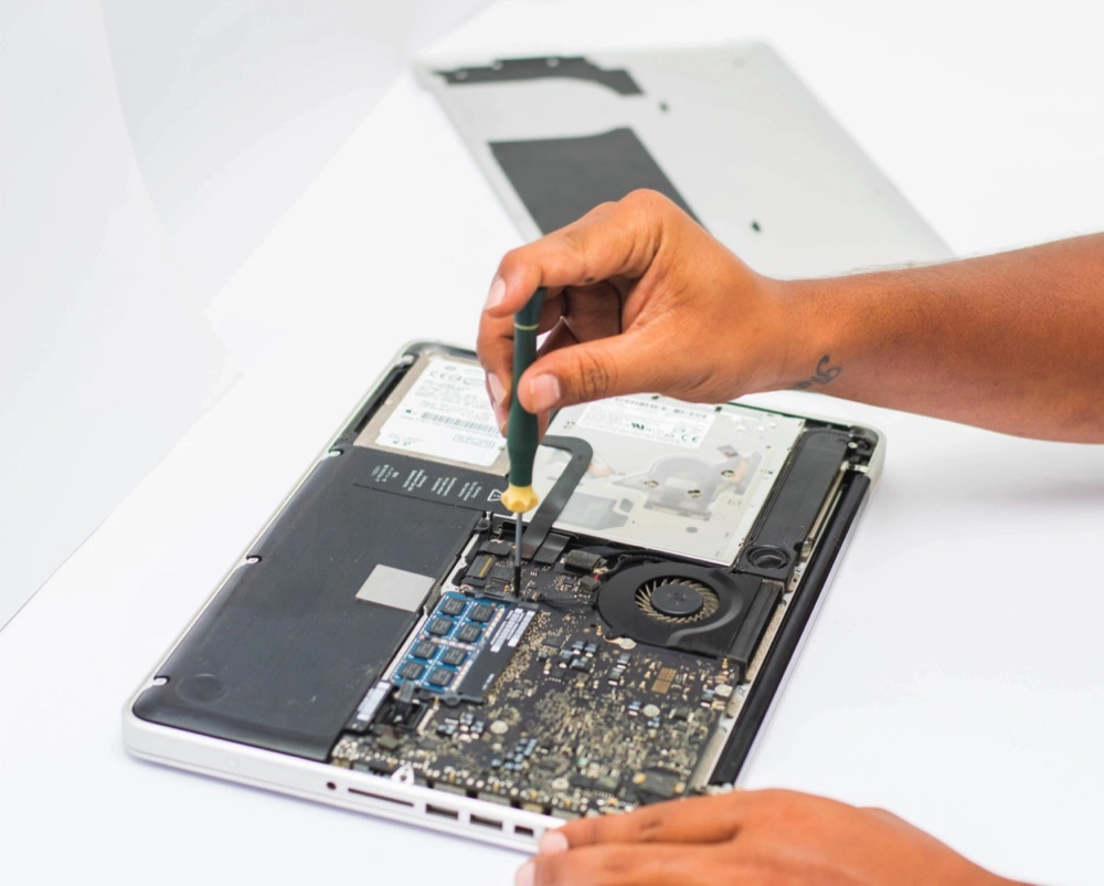 Person Repairing hp laptop
